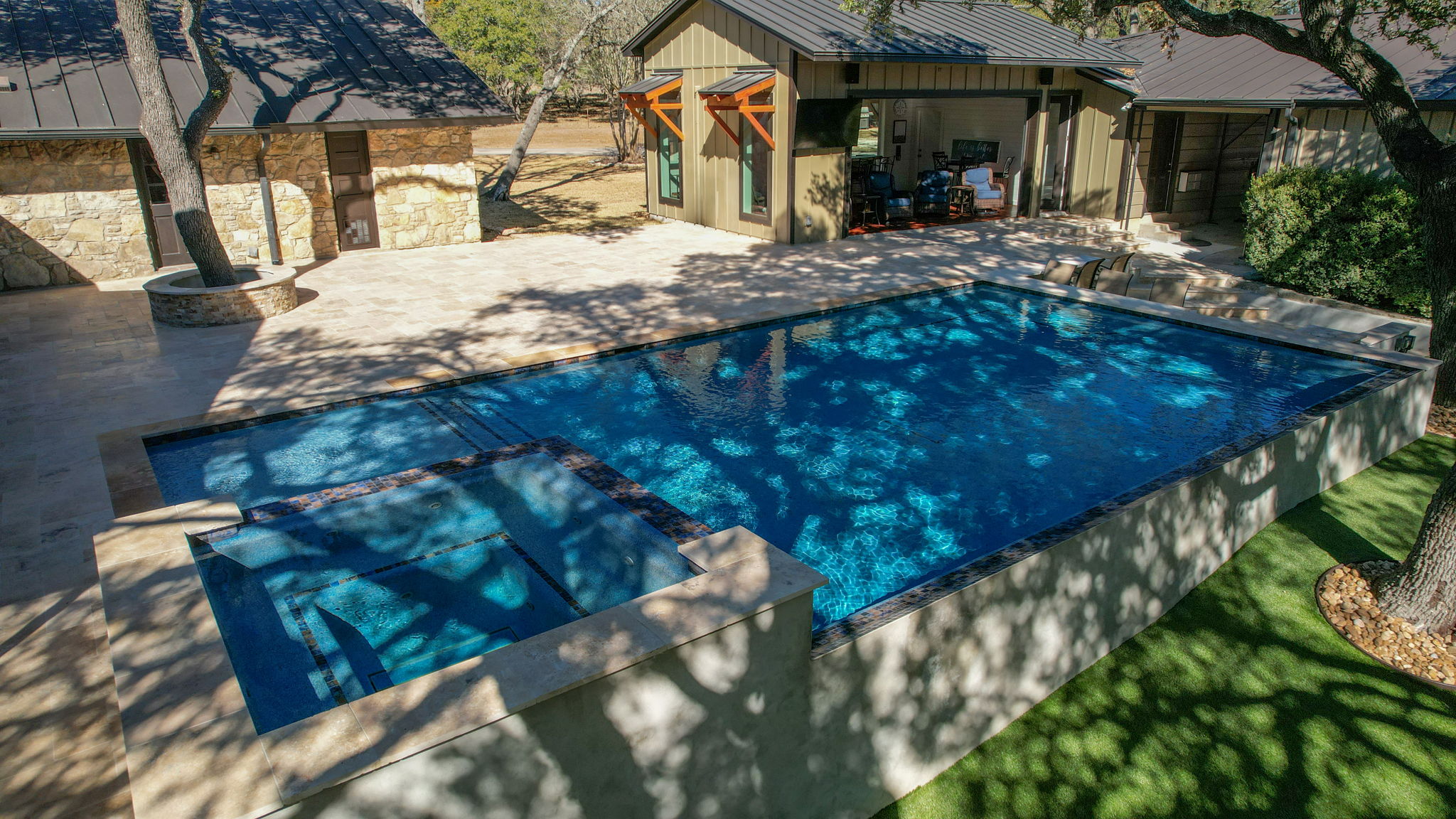 Drone shot of pool integrated into landscape